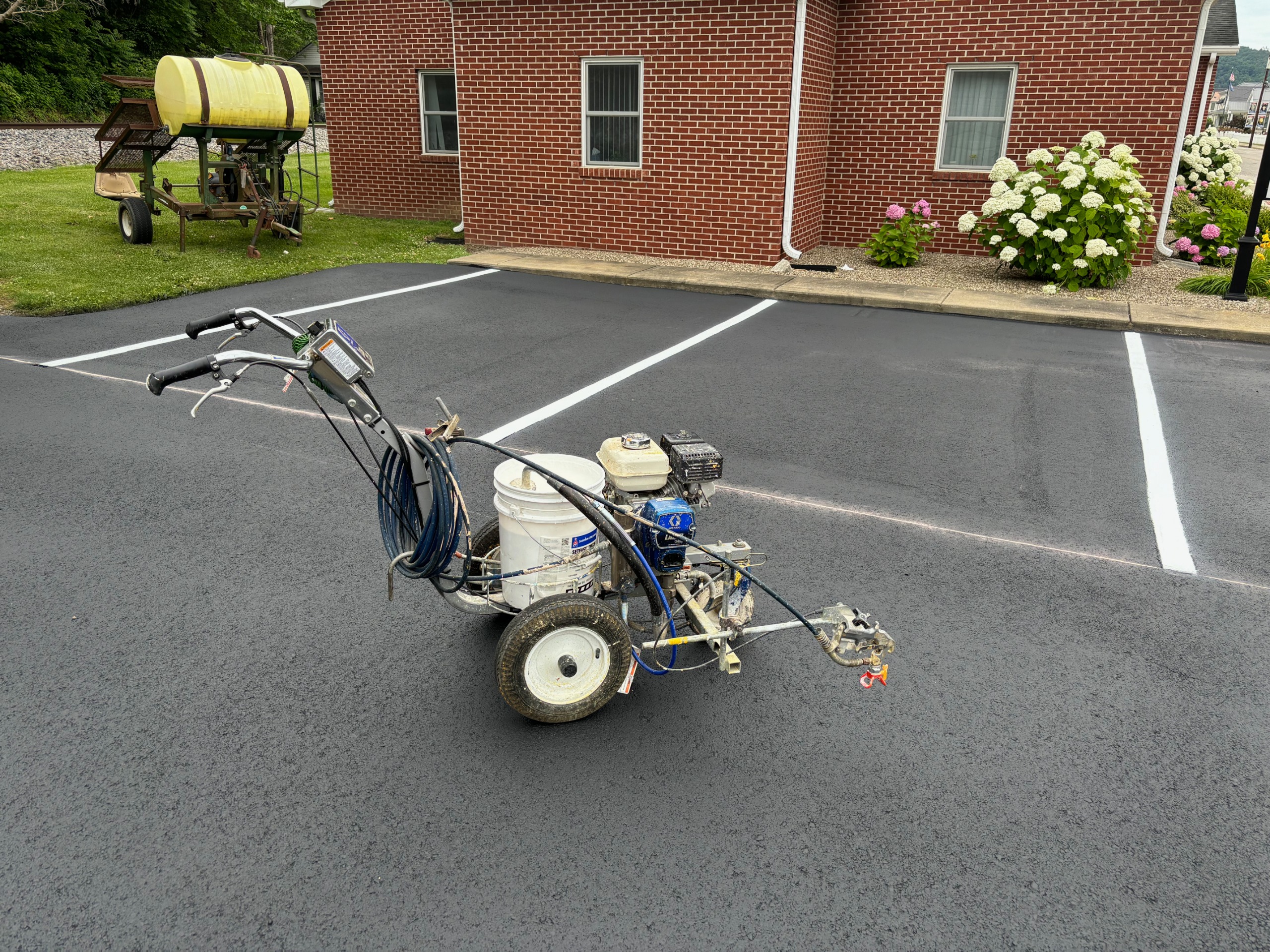 Freshly sealcoated driveway in a Cincinnati neighborhood